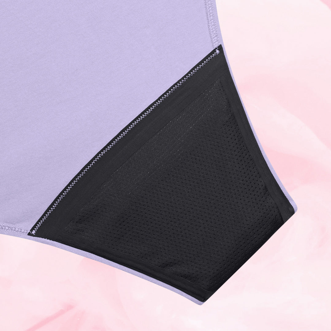 Culotte menstruelle ComfortFit Essentielle Brazilian Heavy, offrant protection fiable avec gousset ajusté et technologie TriTech pour absorption rapide, idéale pour flux léger.