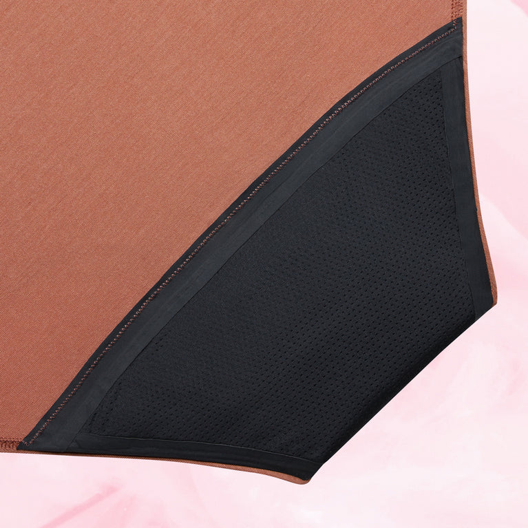 Culotte menstruelle Confort Premium High Waist, gros plan sur le tissu doux, offrant discrétion et confort avec protection maximale.