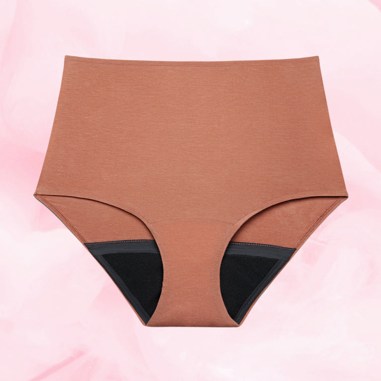 Culotte menstruelle Confort Premium High Waist Moderate, douce et discrète, offrant protection maximale grâce à la technologie TriTech Performance pour un confort jusqu'à 12 heures.