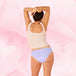 Une femme portant la culotte menstruelle ComfortFit Essentielle Brazilian Moderate, offrant protection et confort grâce à sa coupe taille haute et technologie TriTech Performance.
