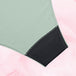 Culotte menstruelle ComfortFit Essentielle Brazilian Light en gros plan, montrant le tissu en polyamide recyclé avec motif discret, coutures soignées et coupe taille haute.