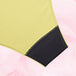 Culotte menstruelle ComfortFit Essentielle Brazilian Light avec motif, coutures précises, et tissu absorbant, offrant protection discrète et fiable pour flux léger.