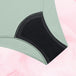 Gros plan sur la culotte menstruelle ComfortFit Essentielle Brazilian Moderate, montrant la texture du tissu, offrant protection durable et ajustement ComfortFit pour flux légers.