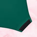 Culotte Menstruelle High Waist Light avec bords noirs, offrant confort et protection pour flux léger, sur fond rose.