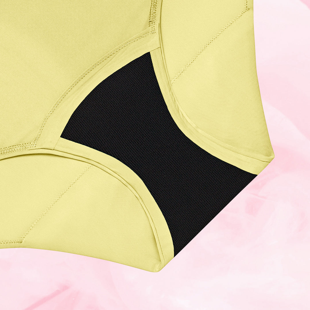 Culotte menstruelle réutilisable à taille haute pour flux modéré, offrant protection jusqu'à 12 heures, fabriquée avec tissu absorbant et respirant.
