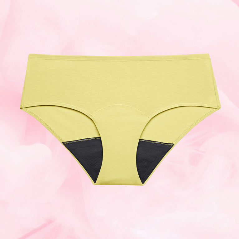 Culotte menstruelle ComfortFit Essentielle Hipster avec fermeture éclair noire visible, offrant protection fiable et confort grâce à la technologie TriTech Performance et gousset ajusté.