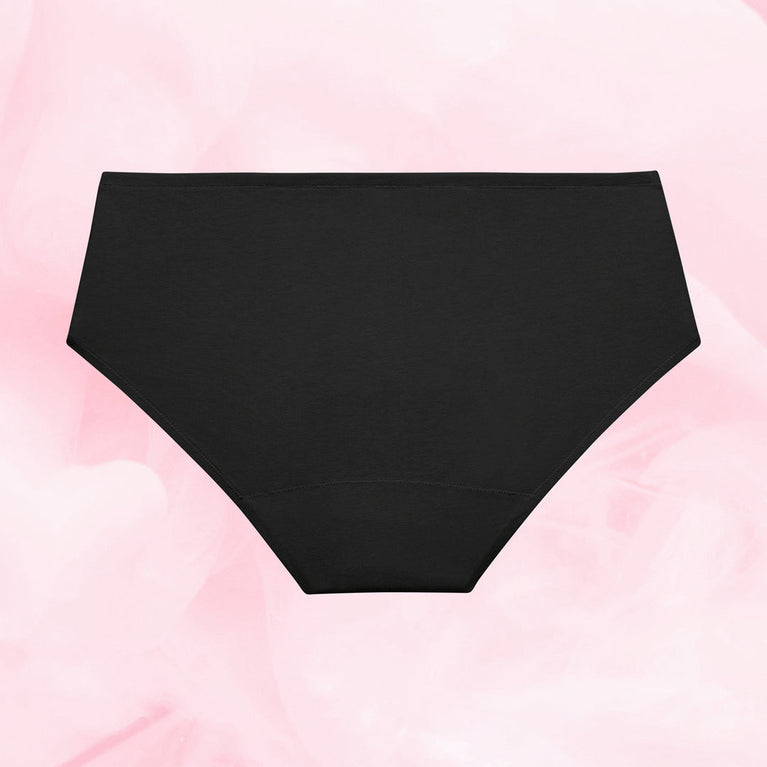 Culotte noire Pack Best-seller, haute, à plat sur fond rose.