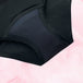 Culotte menstruelle Hipster Full Lace Heavy, noire, offrant protection de 12 heures avec ceinture en dentelle élastiquée, idéale pour flux abondant.