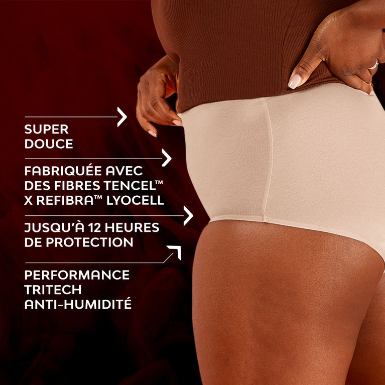 Une femme portant la culotte menstruelle Confort Premium High Waist Moderate, avec design taille haute pour un confort et une discrétion optimale.