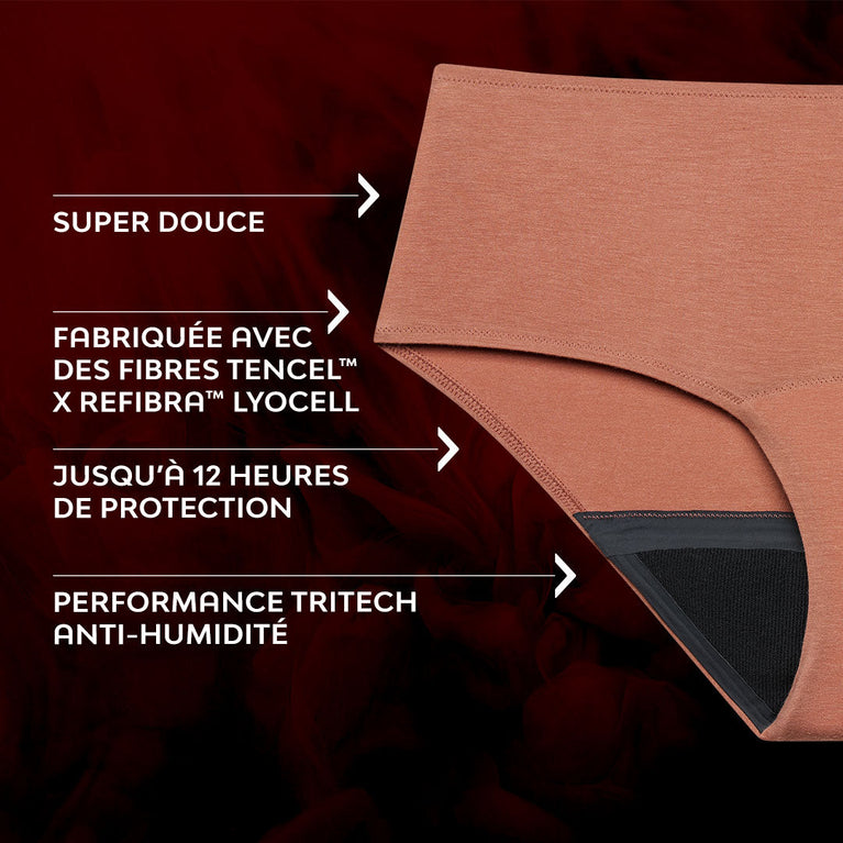 Culotte menstruelle Confort Premium Hipster Moderate, vue rapprochée du tissu doux, coupe taille basse offrant protection discrète avec technologie TriTech Performance.