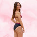 Culotte menstruelle High Leg Moderate, portée par une femme, offre confort et protection jusqu&