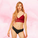 Culotte menstruelle Brazilian Heavy, portée par un modèle, offrant protection absorbante TriTech et confort durable avec ceinture en dentelle élastiquée.