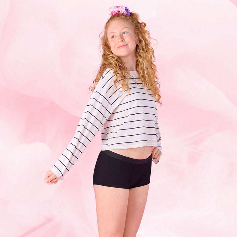 Jeune femme portant Ados - Pack de 5 Boxers flux modéré.