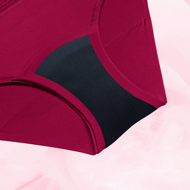 Culotte menstruelle Bikini Basic Heavy, coupe bikini classique, gros plan sur le tissu, offre absorption élevée pour flux abondant avec technologie TriTech Performance.