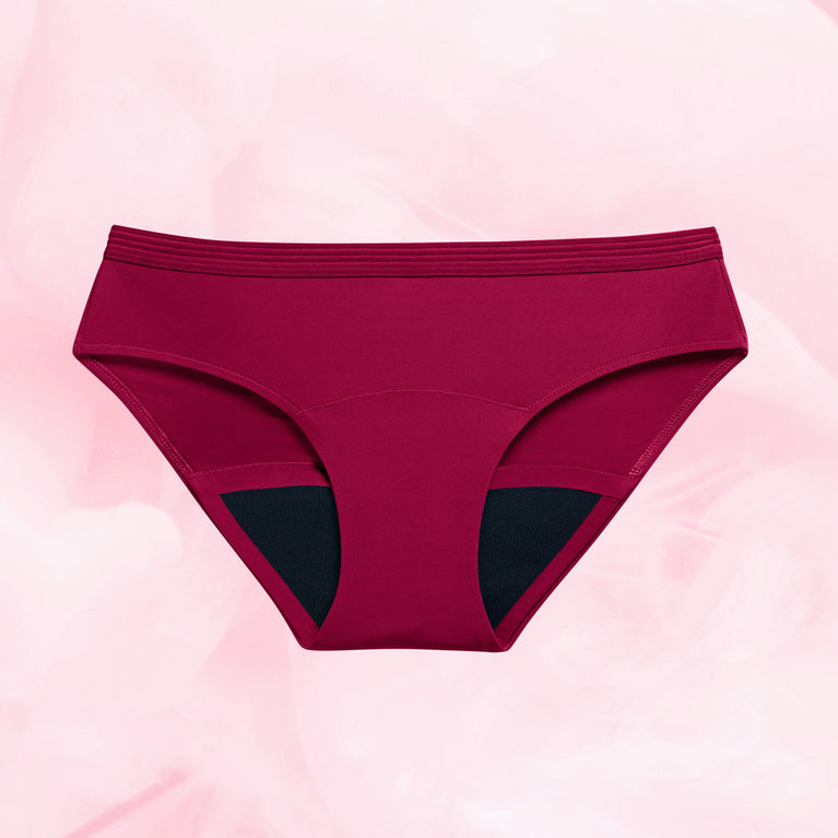 Culotte menstruelle Bikini Basic Moderate, gros plan montrant le design confortable avec taille élastique, offrant absorption pour flux modérés jusqu'à 12 heures.