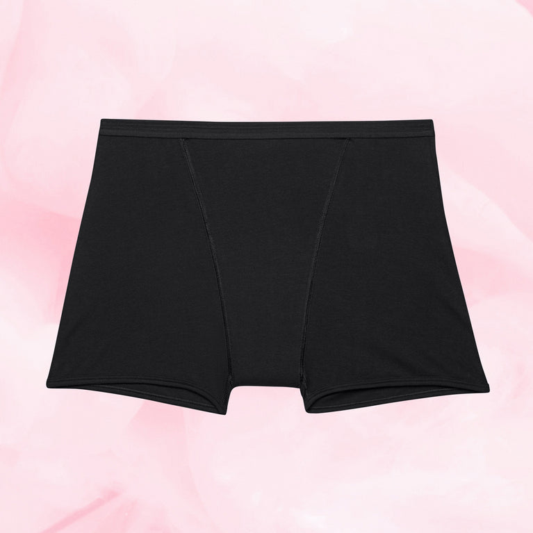 Culotte menstruelle noire Nouveau ComfortFit Boyleg Nuit, offrant protection anti-fuites et confort optimal pour la nuit grâce à la technologie TriTech Performance.